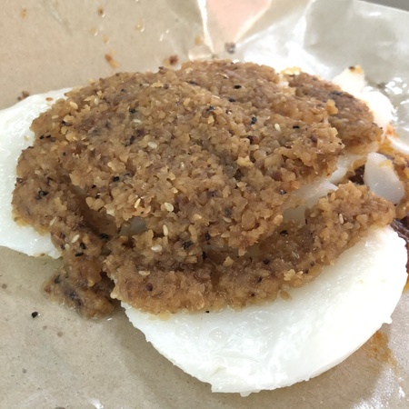 Steamed rice cakes that are served with a complementing side of salty cai po (preserved radish) and chili.